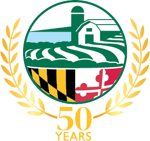 Logo of the Maryland Department of Agriculture, showing a pastoral scene and the words "50 years"